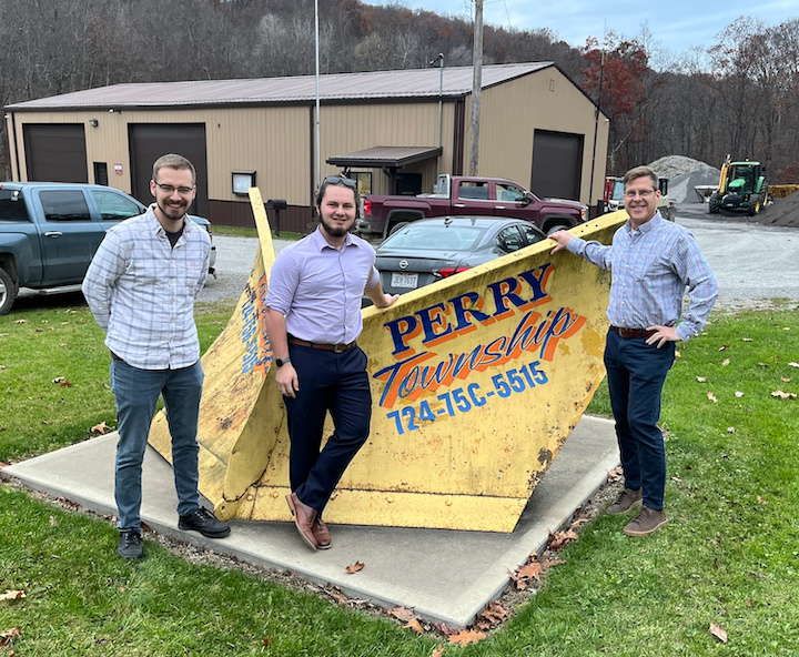 "Students who served in Perry Township pose with Professor George Dougherty"