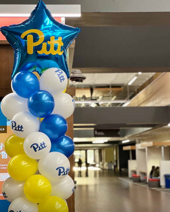 "Balloons decorate Posvar Hall"