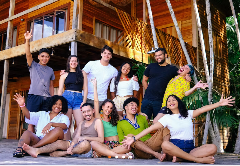 Representatives from the Brazilian organization COJOVEM pose