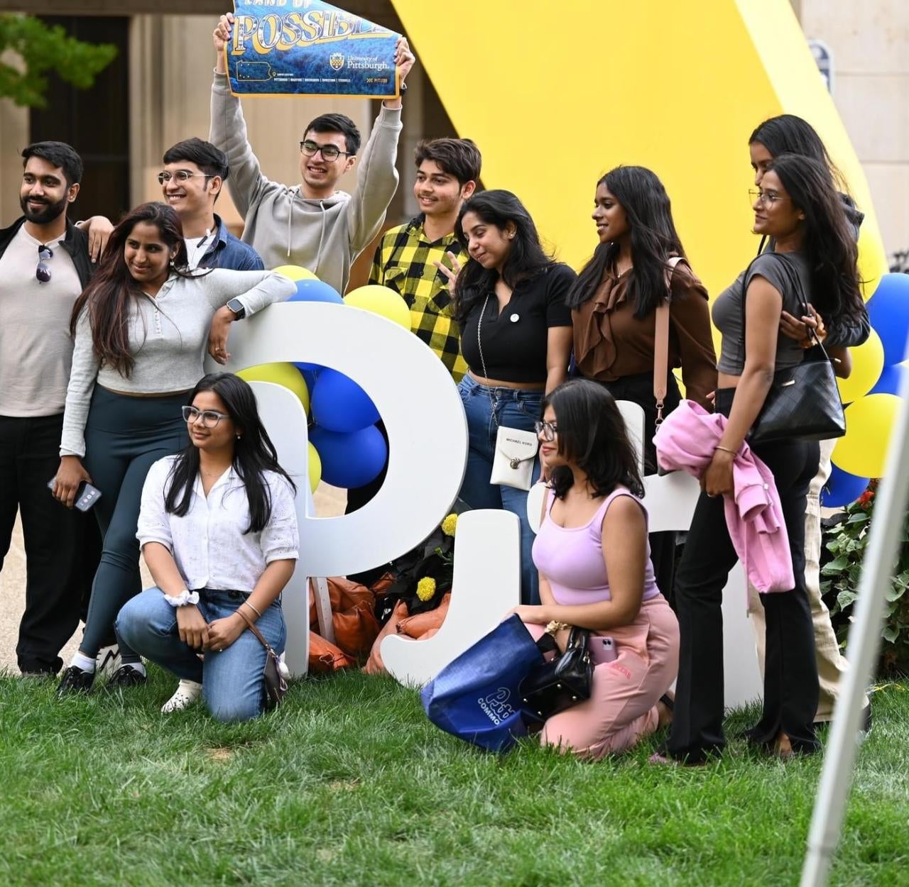 Students pose at Pitt event 