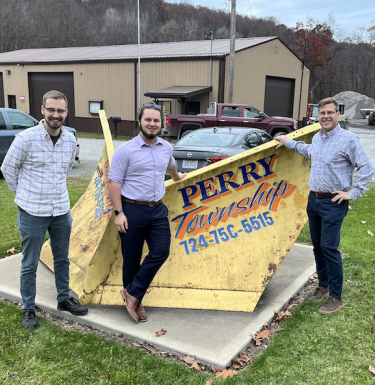 Students pose with Professor George Dougherty in Perry Township