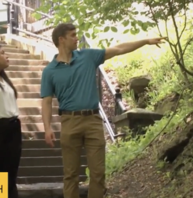 Professor Weber walks with students in the park in KDKA-TV segment 